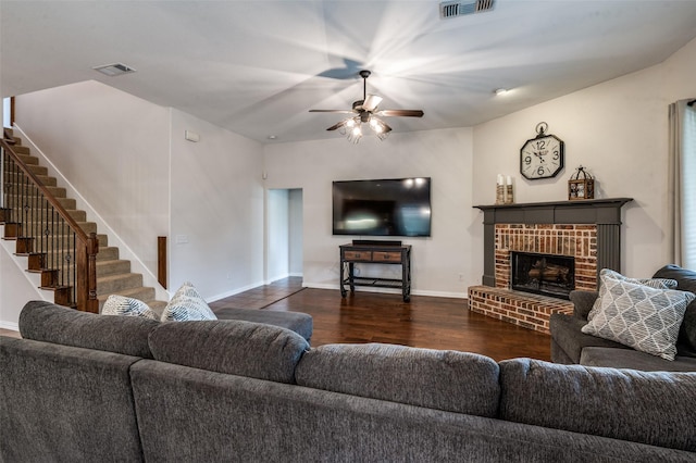 7601 Willowbend Dr, Mckinney, TX 75071 - living area with a ceiling fan, wood finished floors, stairs, and a fireplace