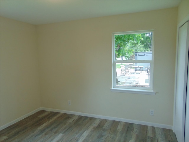 802 Acton Ave, Duncanville, TX 75137 - spare room featuring wood finished floors