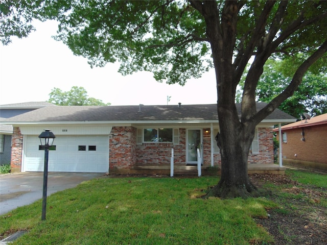 802 Acton Ave, Duncanville, TX 75137 - ranch-style house featuring a garage, concrete driveway, brick siding, and a front yard