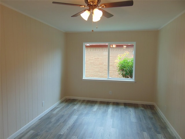 802 Acton Ave, Duncanville, TX 75137 - spare room with wood finished floors, a ceiling fan, and ornamental molding