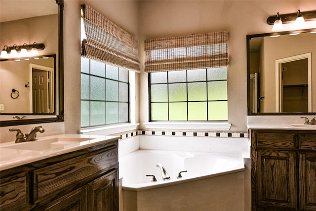 104 Coldwater Creek Ln, Weatherford, TX 76088 - bathroom with two vanities and a bath