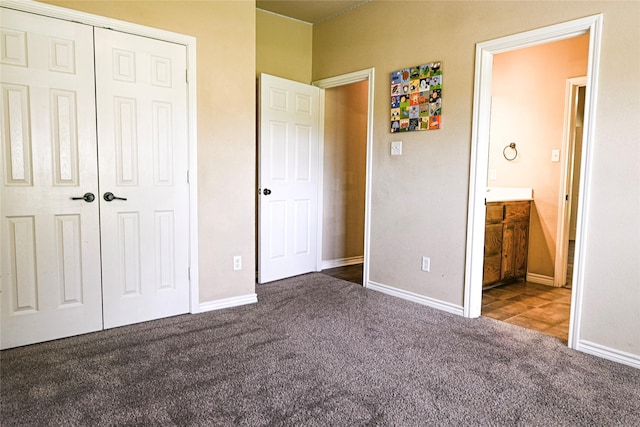 104 Coldwater Creek Ln, Weatherford, TX 76088 - unfurnished bedroom with carpet floors, a closet, and connected bathroom