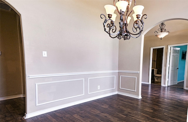 104 Coldwater Creek Ln, Weatherford, TX 76088 - unfurnished dining area featuring arched walkways, a chandelier, and dark wood-style flooring