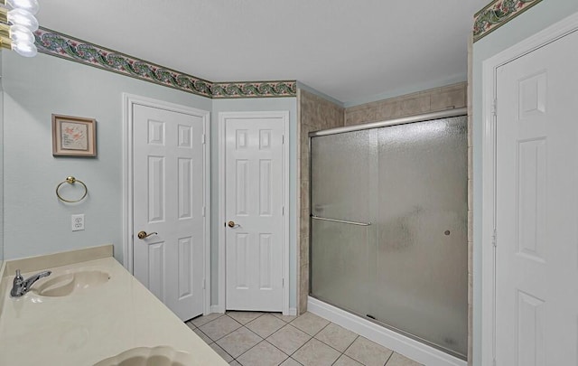 308 Greystone Dr, Lorena, TX 76655 - full bathroom featuring tile patterned floors, a stall shower, and vanity