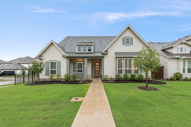 2232 Offerande Dr, Fort Worth, TX 76008 - view of front of house featuring a standing seam roof, a porch, a metal roof, and a shingled roof
