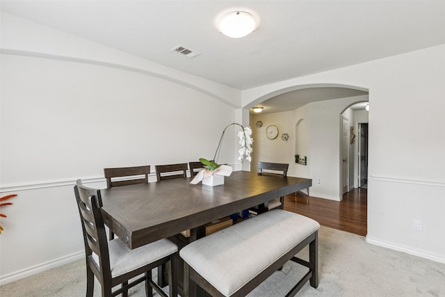 2708 Ferdinand, Grand Prairie, TX 75054 - dining space with arched walkways and light carpet