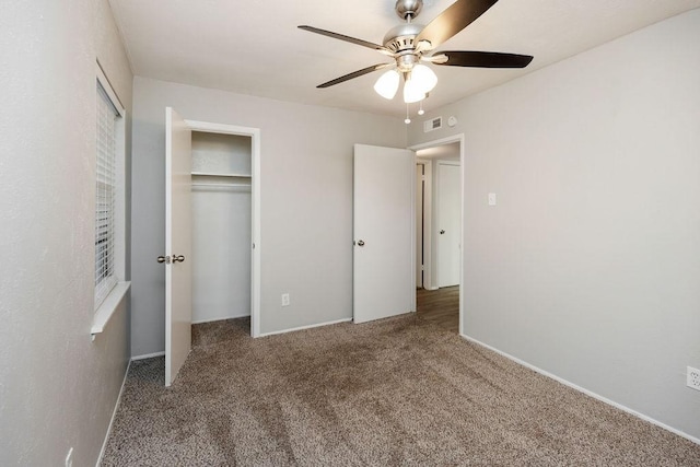 520 Hawthorne Dr, Allen, TX 75002 - unfurnished bedroom featuring carpet flooring, a closet, and a ceiling fan