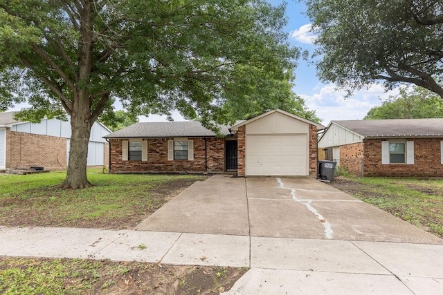 520 Hawthorne Dr, Allen, TX 75002 - ranch-style home with a garage, driveway, brick siding, and a front lawn