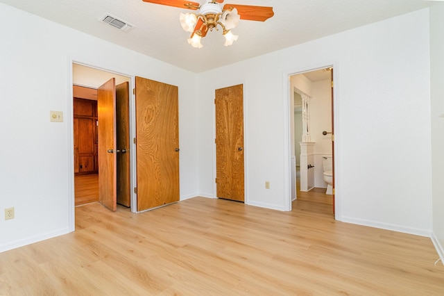 3004 Glasgow Dr, Arlington, TX 76015 - unfurnished bedroom featuring light wood-type flooring, ensuite bath, and ceiling fan