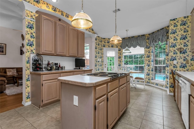 4316 Turnberry Ct, Plano, TX 75024 - kitchen featuring wallpapered walls, a kitchen island, light countertops, white dishwasher, and hanging light fixtures