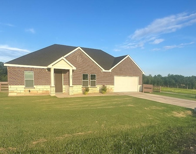 2352 Wynchase Ln, Crandall, TX 75114 - view of front of property featuring driveway, a front lawn, brick siding, and a garage