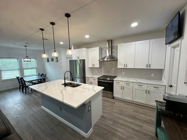 2352 Wynchase Ln, Crandall, TX 75114 - kitchen with appliances with stainless steel finishes, wall chimney range hood, dark wood-style flooring, tasteful backsplash, and recessed lighting