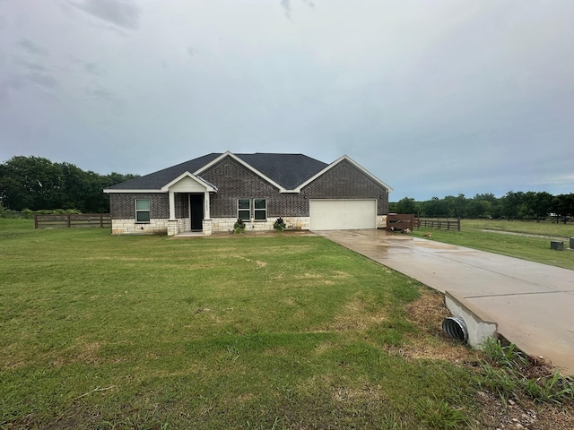 2352 Wynchase Ln, Crandall, TX 75114 - view of front of home featuring concrete driveway, a garage, brick siding, and roof with shingles