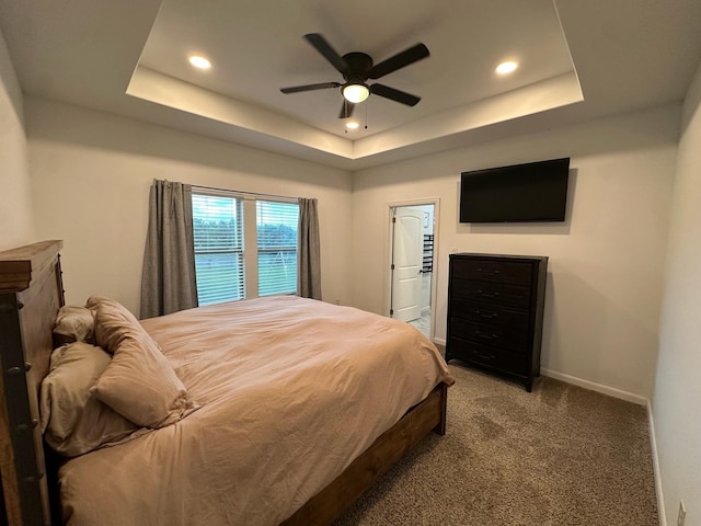 2352 Wynchase Ln, Crandall, TX 75114 - carpeted bedroom with recessed lighting, a tray ceiling, and ceiling fan