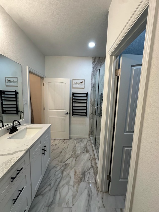 2352 Wynchase Ln, Crandall, TX 75114 - bathroom with marble finish floors, vanity, a marble finish shower, a textured ceiling, and recessed lighting