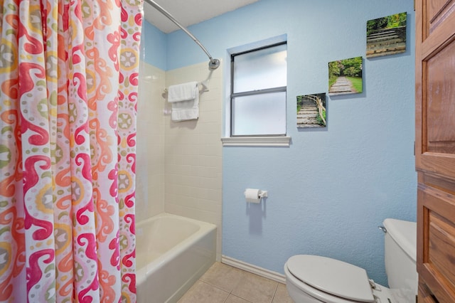 3121 Oakdale Dr, Hurst, TX 76054 - full bathroom featuring tile patterned floors and shower / bath combo