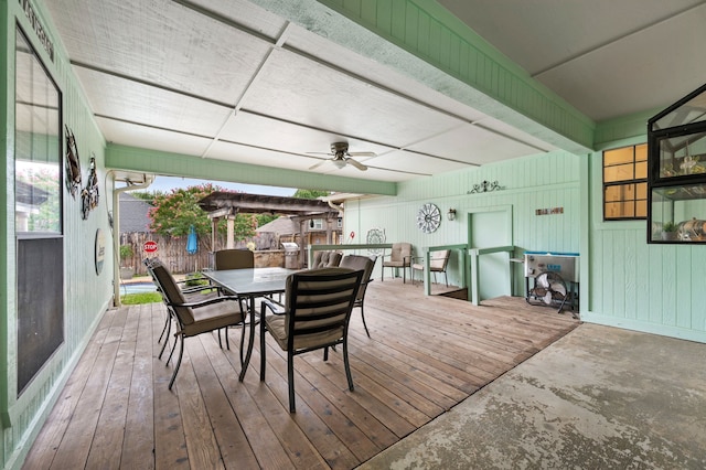 3121 Oakdale Dr, Hurst, TX 76054 - wooden deck featuring outdoor dining area and ceiling fan