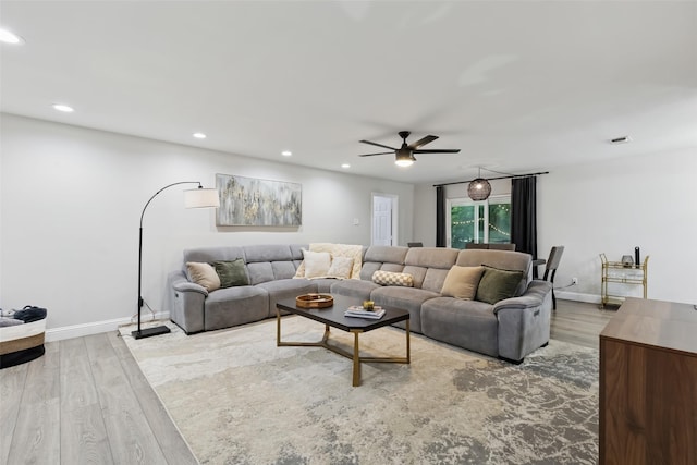 348 Thompson St, Fort Worth, TX 76134 - living area featuring wood finished floors, ceiling fan, and recessed lighting