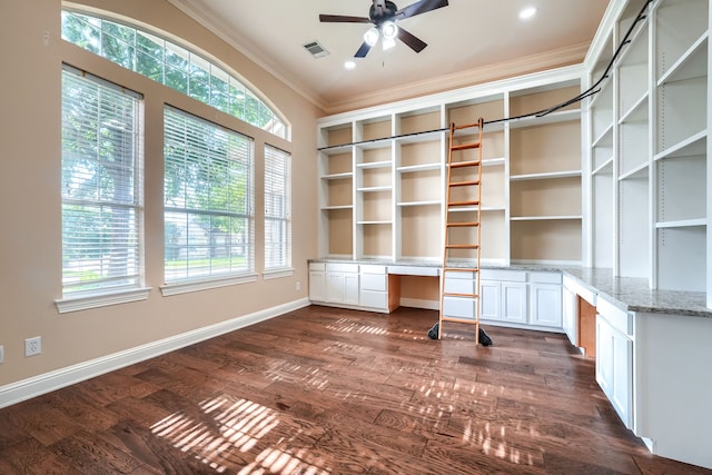 305 Wood Duck Ln, Mckinney, TX 75072 - unfurnished office with built in study area, ornamental molding, ceiling fan, healthy amount of natural light, and dark wood-style flooring