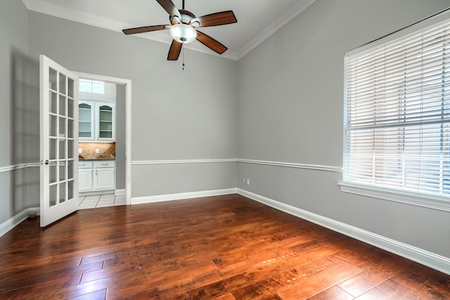 305 Wood Duck Ln, Mckinney, TX 75072 - empty room featuring ornamental molding, hardwood / wood-style flooring, and ceiling fan