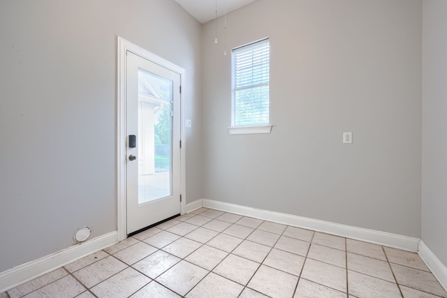 305 Wood Duck Ln, Mckinney, TX 75072 - doorway to outside with light tile patterned floors