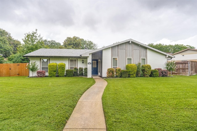 8688 Grenadier Ct, Dallas, TX 75238 - view of front of home with board and batten siding and brick siding