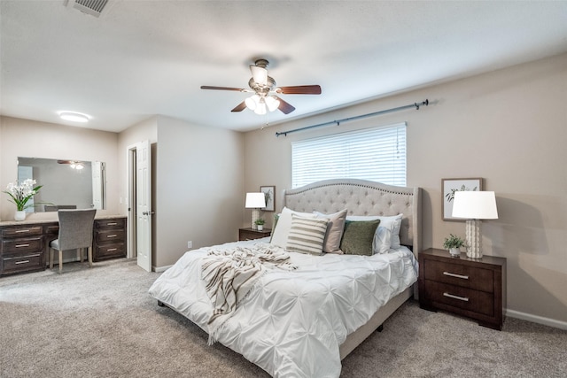 8688 Grenadier Ct, Dallas, TX 75238 - bedroom featuring light colored carpet, an office area, and ceiling fan