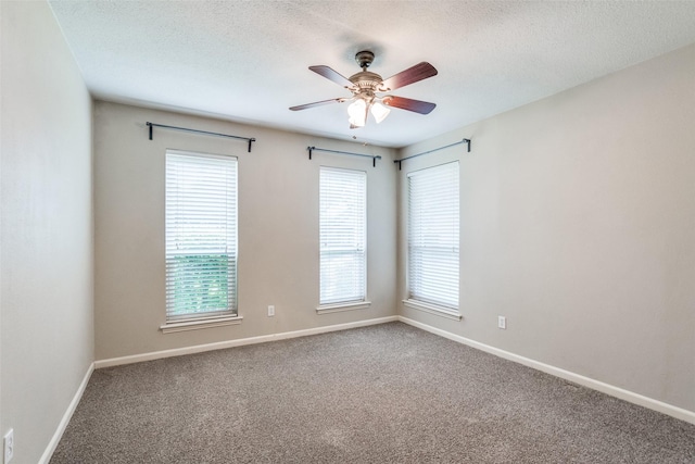 8688 Grenadier Ct, Dallas, TX 75238 - carpeted empty room with ceiling fan and a textured ceiling