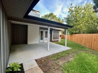 8688 Grenadier Ct, Dallas, TX 75238 - fenced backyard featuring a patio area