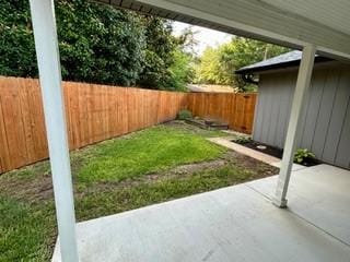 8688 Grenadier Ct, Dallas, TX 75238 - fenced backyard featuring a patio area