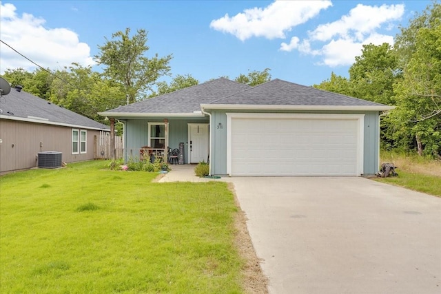 311 W Oak St, Whitewright, TX 75491 - view of front of property with a front yard, a porch, driveway, an attached garage, and a shingled roof