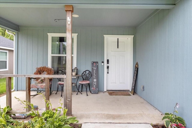 311 W Oak St, Whitewright, TX 75491 - property entrance with a porch