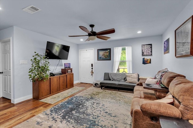 311 W Oak St, Whitewright, TX 75491 - living room featuring wood finished floors, ceiling fan, and recessed lighting