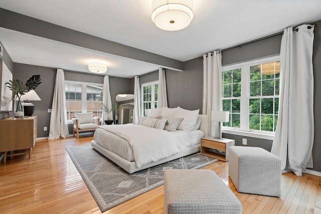 7845 Blackbird Ln, Dallas, TX 75238 - bedroom with light wood-style flooring and baseboards