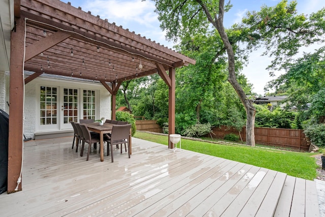 7845 Blackbird Ln, Dallas, TX 75238 - wooden terrace with a pergola, a fenced backyard, outdoor dining area, and french doors