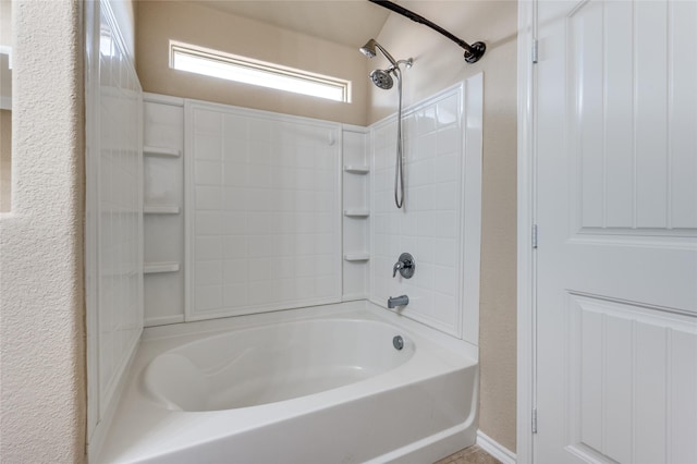408 Citation Ln, Ponder, TX 76259 - bathroom with bathtub / shower combination and a textured wall