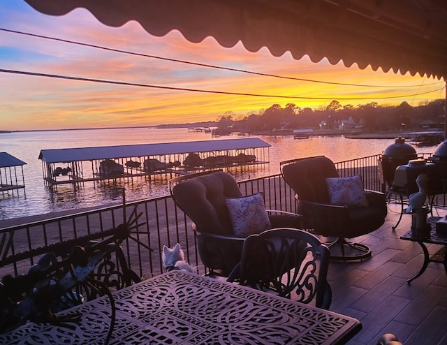 849 S Gun Barrel Ln Unit D6, Gun Barrel City, TX 75156 - deck at dusk featuring a water view