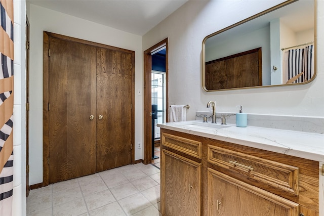 1507 Abrams Rd, Dallas, TX 75214 - bathroom featuring vanity and tile patterned floors