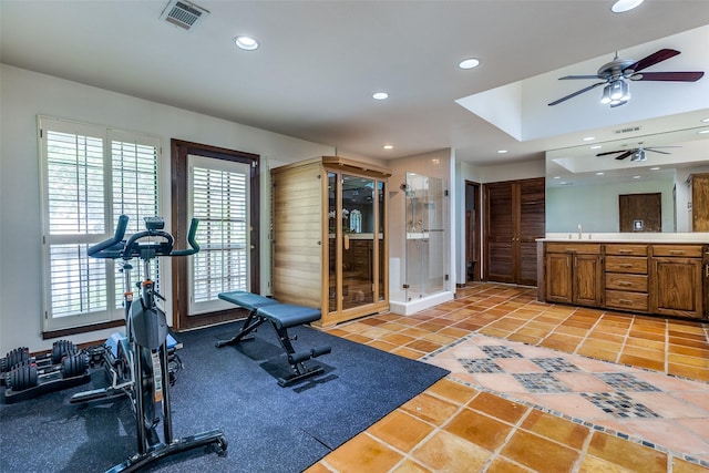 1507 Abrams Rd, Dallas, TX 75214 - exercise room featuring a ceiling fan, healthy amount of natural light, recessed lighting, and light tile patterned floors