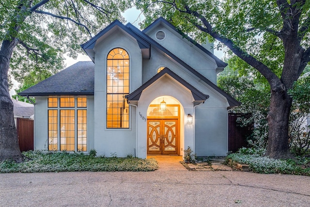 1507 Abrams Rd, Dallas, TX 75214 - view of front facade with stucco siding and a shingled roof
