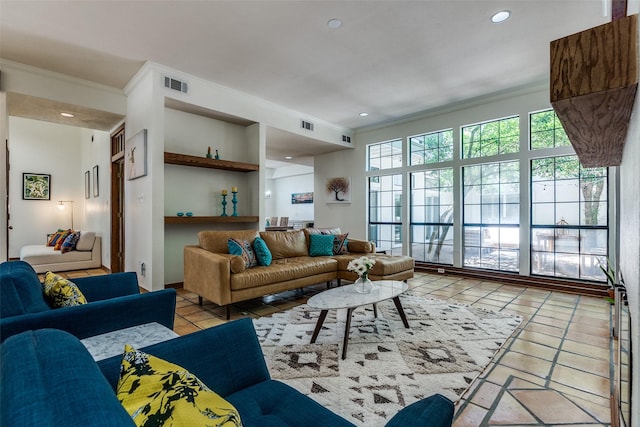 1507 Abrams Rd, Dallas, TX 75214 - living area with crown molding, tile patterned flooring, and recessed lighting