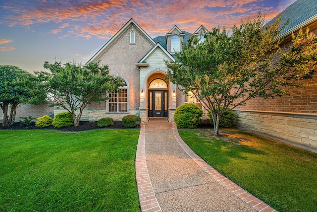 8800 Summit Point Ct, Fort Worth, TX 76179 - traditional home with a front lawn and brick siding