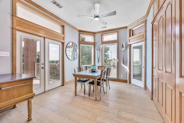 8800 Summit Point Ct, Fort Worth, TX 76179 - dining space featuring crown molding, light wood finished floors, a ceiling fan, and french doors