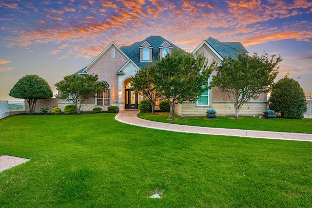 8800 Summit Point Ct, Fort Worth, TX 76179 - view of front of property featuring brick siding, a front lawn, and stone siding