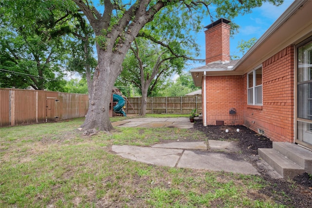 522 Carol Ct, Richardson, TX 75081 - fenced backyard with a patio