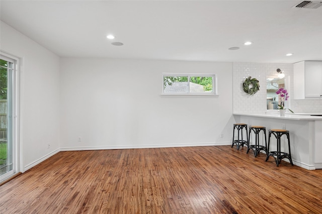 522 Carol Ct, Richardson, TX 75081 - living area with wood finished floors and recessed lighting