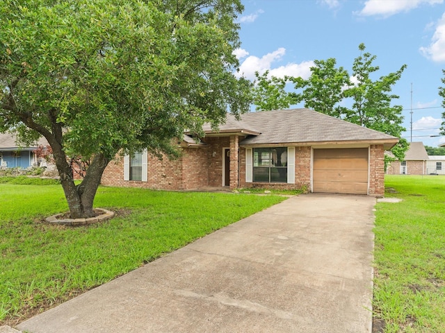 713 Brookhaven Dr, Royse City, TX 75189 - view of front of property featuring driveway, an attached garage, a front yard, brick siding, and a shingled roof