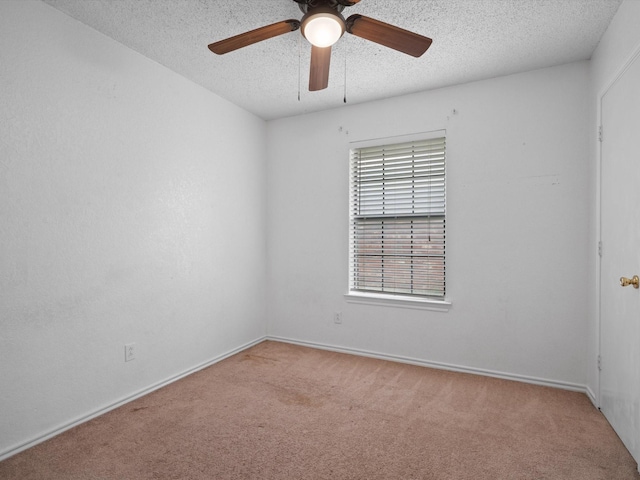 713 Brookhaven Dr, Royse City, TX 75189 - carpeted spare room featuring a textured ceiling and a ceiling fan