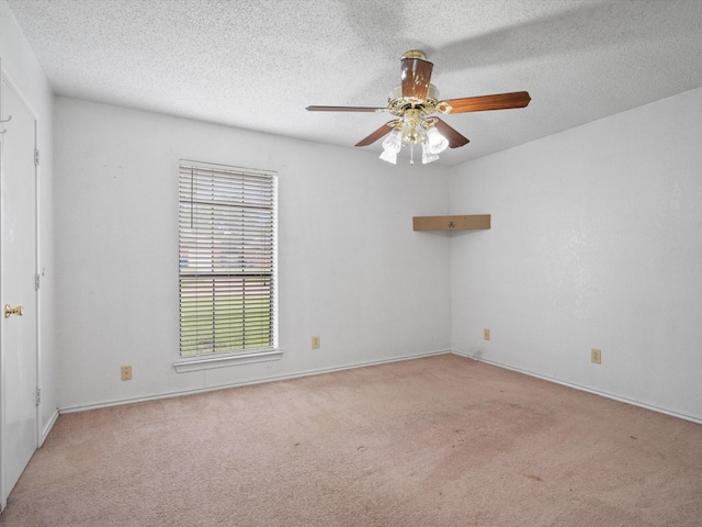 713 Brookhaven Dr, Royse City, TX 75189 - carpeted empty room featuring a ceiling fan and a textured ceiling