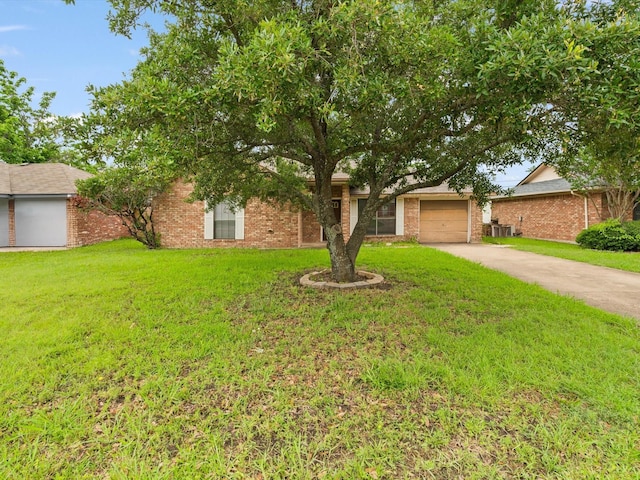 713 Brookhaven Dr, Royse City, TX 75189 - view of front facade with driveway, a front lawn, a garage, and brick siding